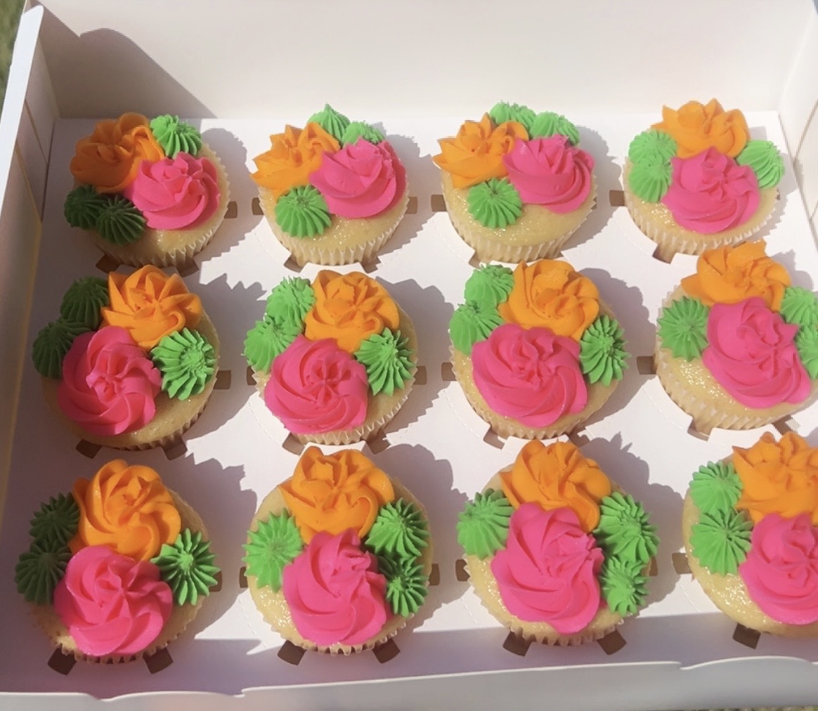 Cupcakes arranged in a box for an order